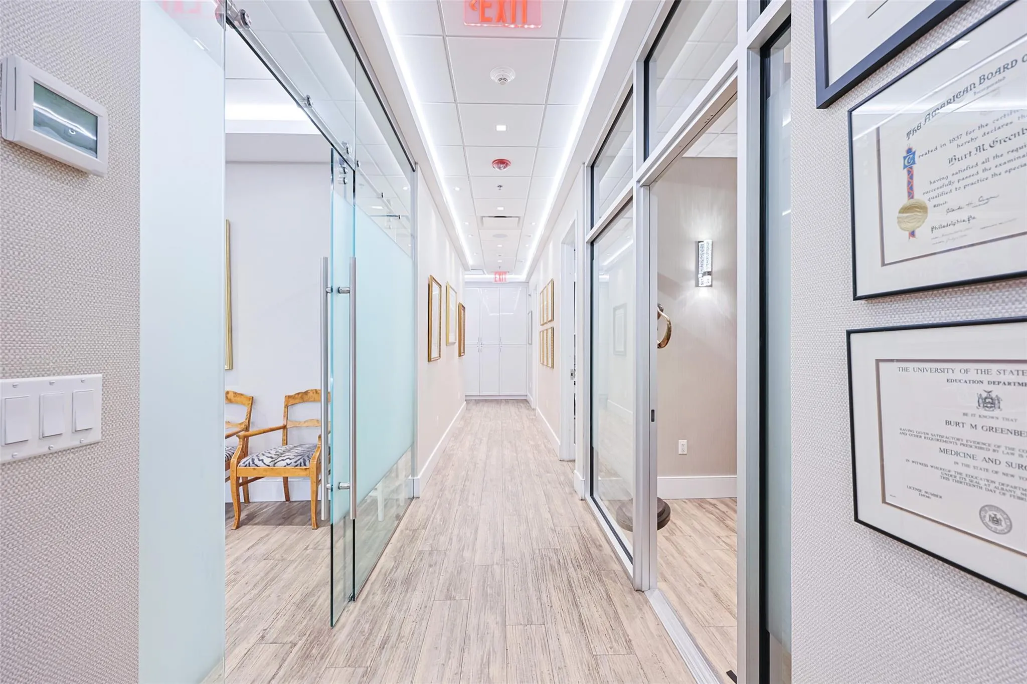Hall featuring light wood-type flooring Hall featuring light wood-type flooring