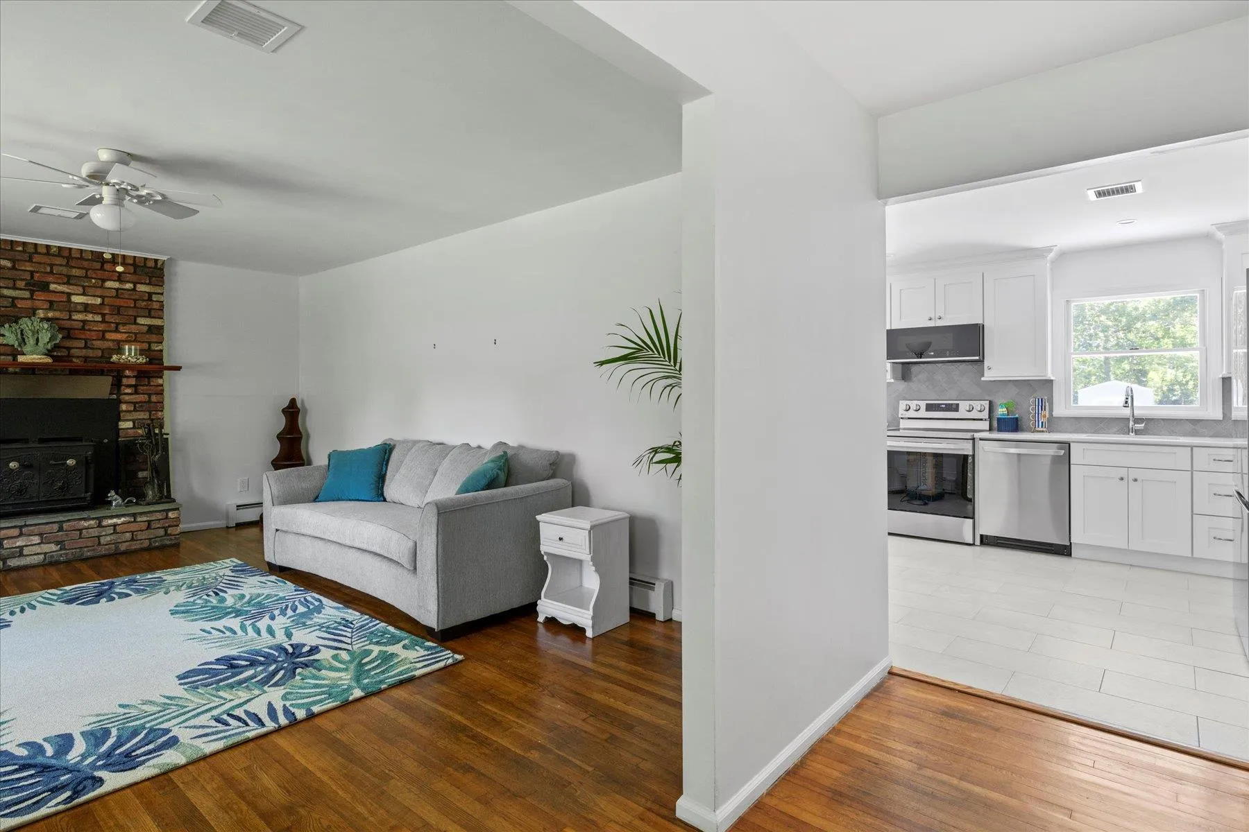 Foyer showing living room and kitchen Foyer showing living room and kitchen