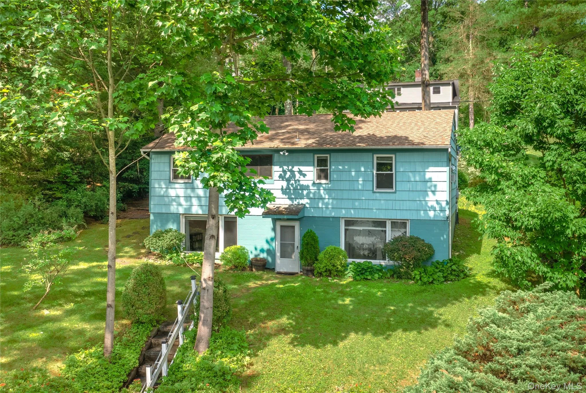 This spacious waterfront cottage spans two levels with 1,960 SF in total. This spacious waterfront cottage spans two levels with 1,960 SF in total.