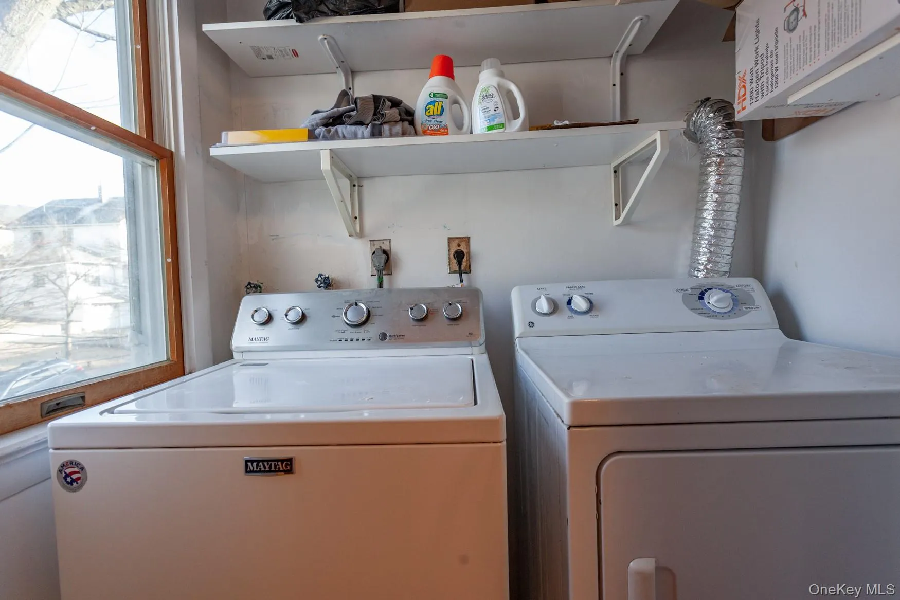 Laundry area with the unit with washer and dryer. Laundry area with the unit with washer and dryer.