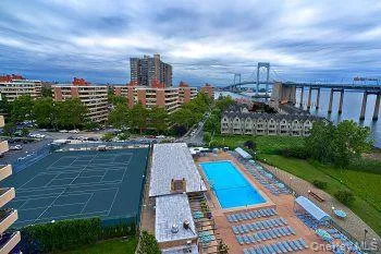 View of swimming pool featuring a water view View of swimming pool featuring a water view