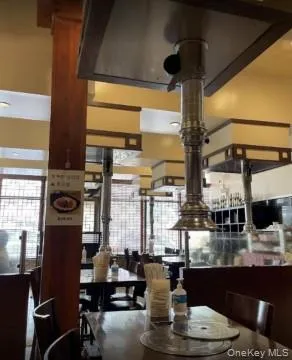 Dining space featuring a high ceiling Dining space featuring a high ceiling