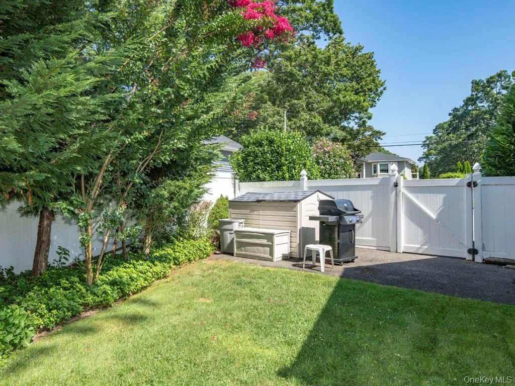 View of yard with a gate View of yard with a gate