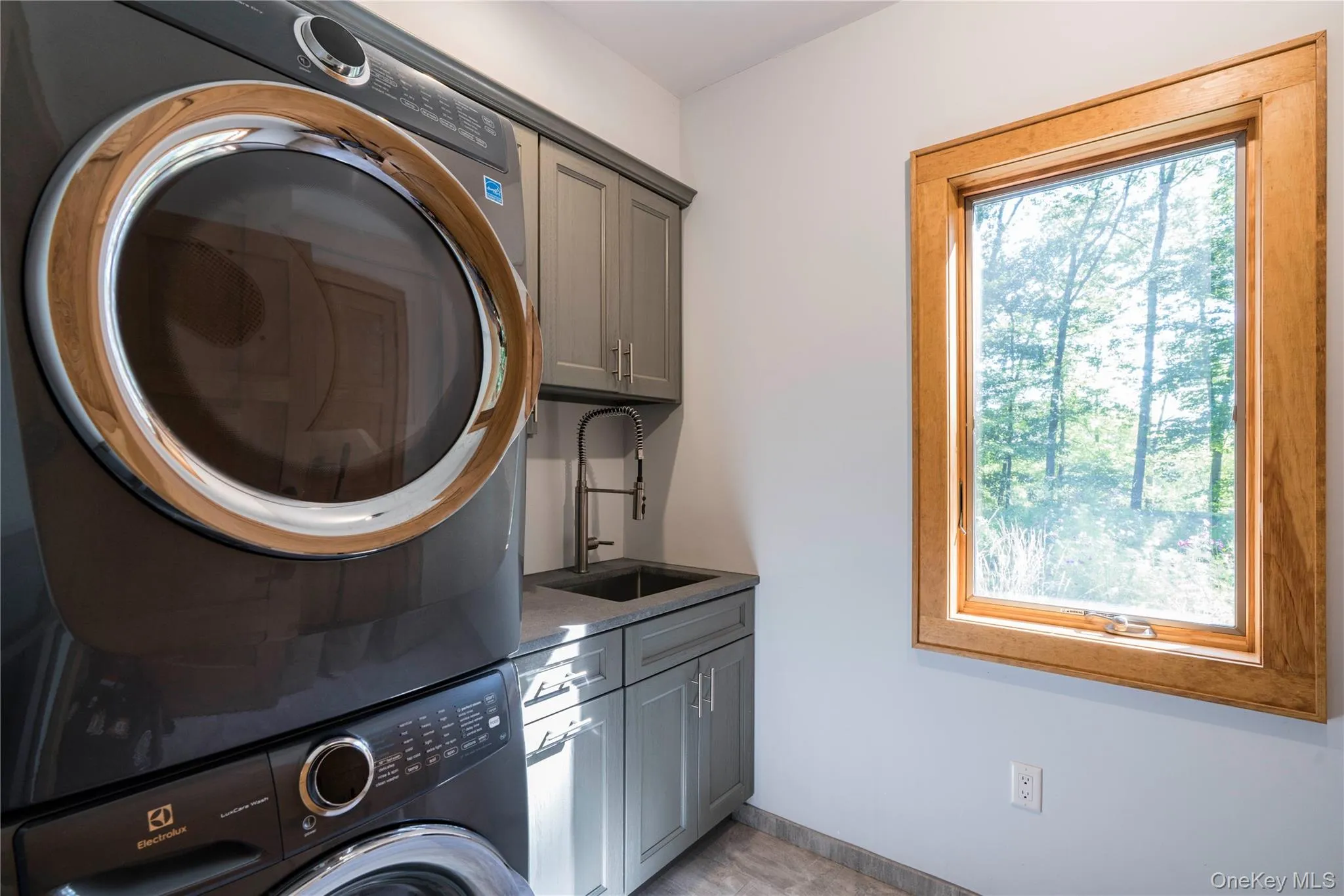 Laundry Room has Plenty Cabinets, a Sink & Dekton Countertop Laundry Room has Plenty Cabinets, a Sink & Dekton Countertop
