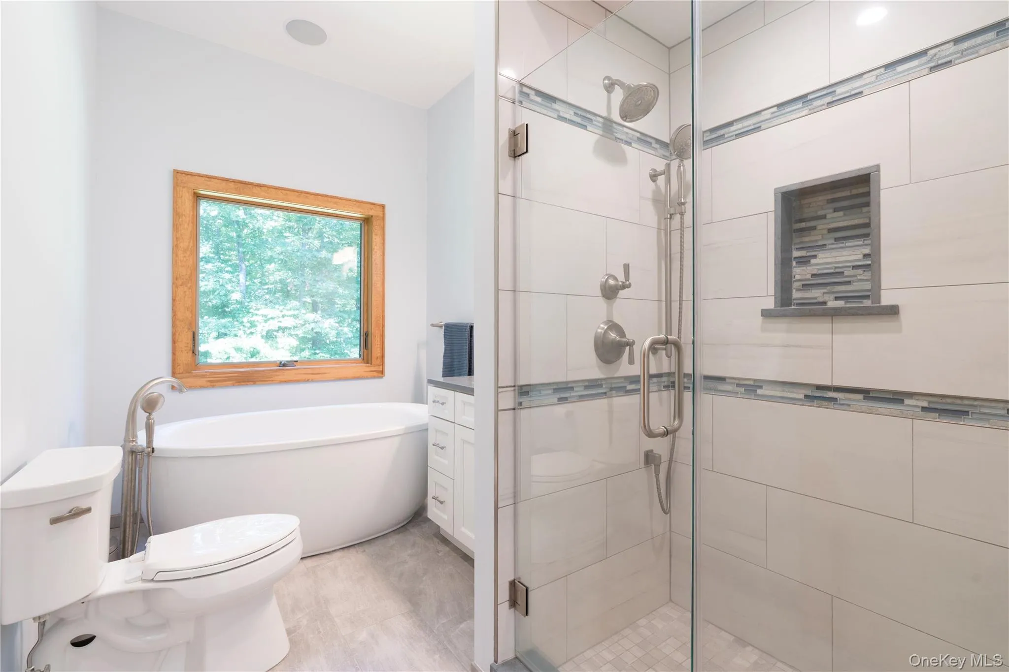 The 2nd Full Bathroom has a Walk-in Tiled Shower The 2nd Full Bathroom has a Walk-in Tiled Shower