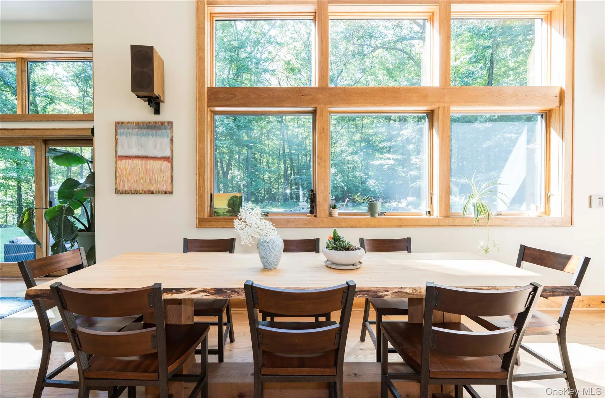 Dining Room's Wall of Windows & Door to Patio Dining Room's Wall of Windows & Door to Patio