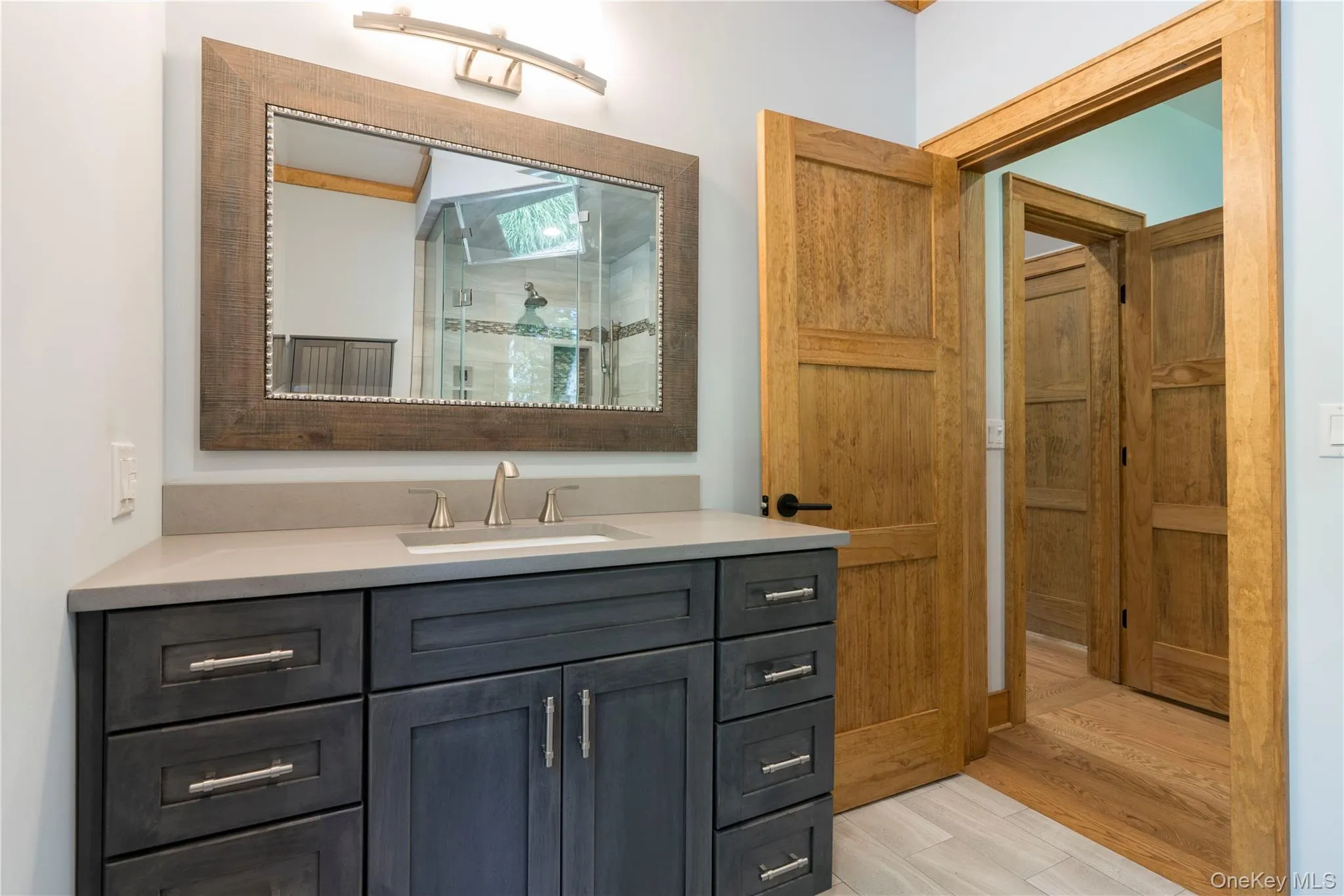 Primary Bath with a Large Vanity & Quartz Countertop Primary Bath with a Large Vanity & Quartz Countertop