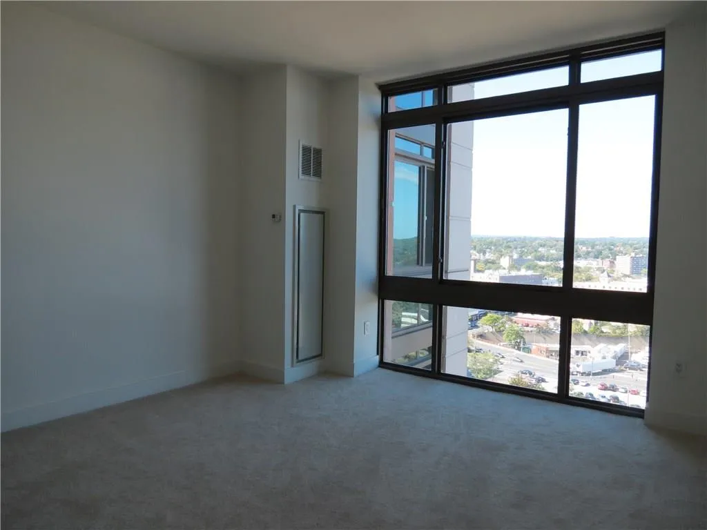 Main bedroom with floor to ceiling windows. Main bedroom with floor to ceiling windows.