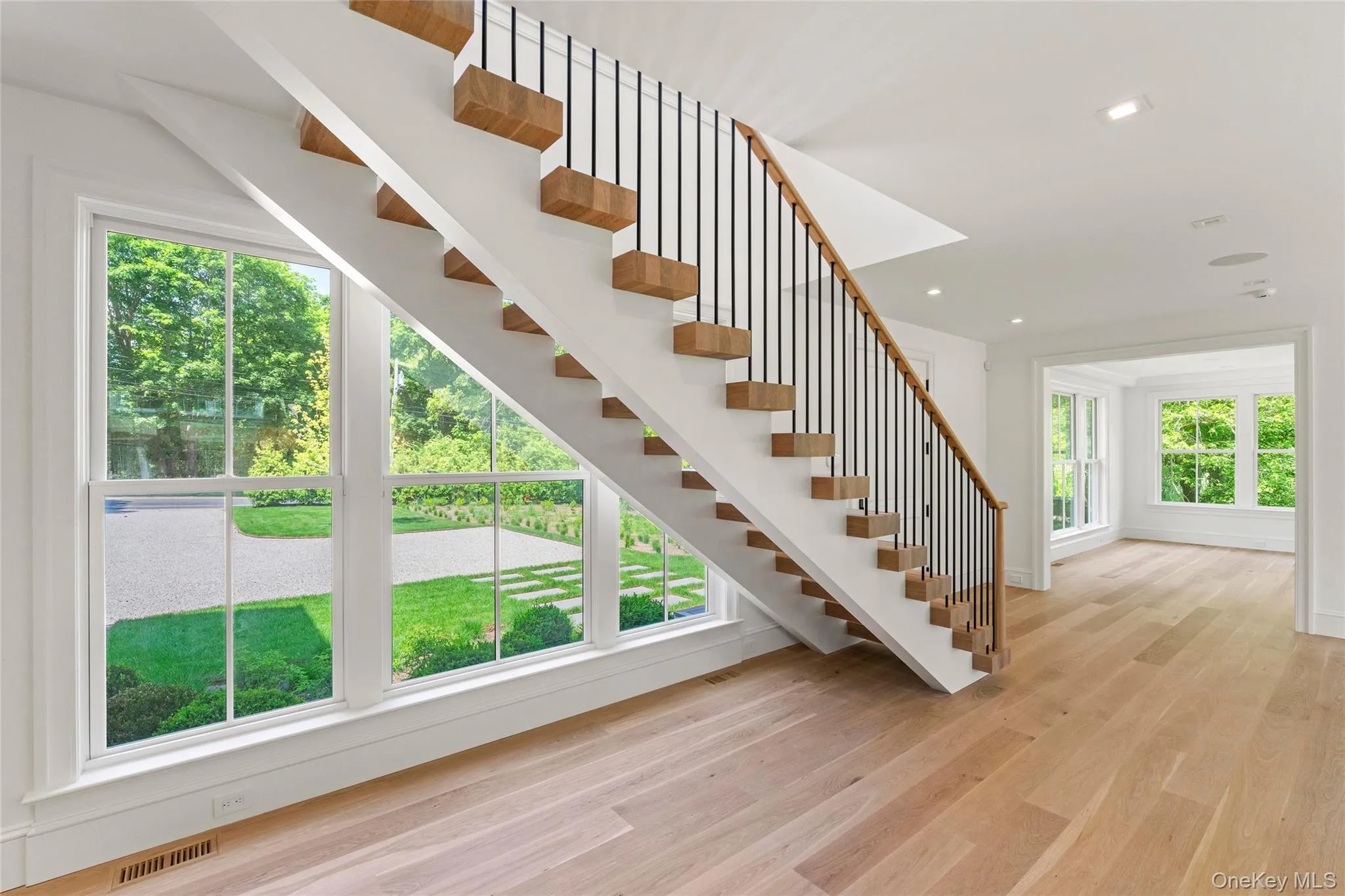 Extraordinary workmanship and details- Solid Oak Stairs with 7'' White Oak finished floors, Large amount of natural light, oversized windows Extraordinary workmanship and details- Solid Oak Stairs with 7'' White Oak finished floors, Large amount of natural light, oversized windows