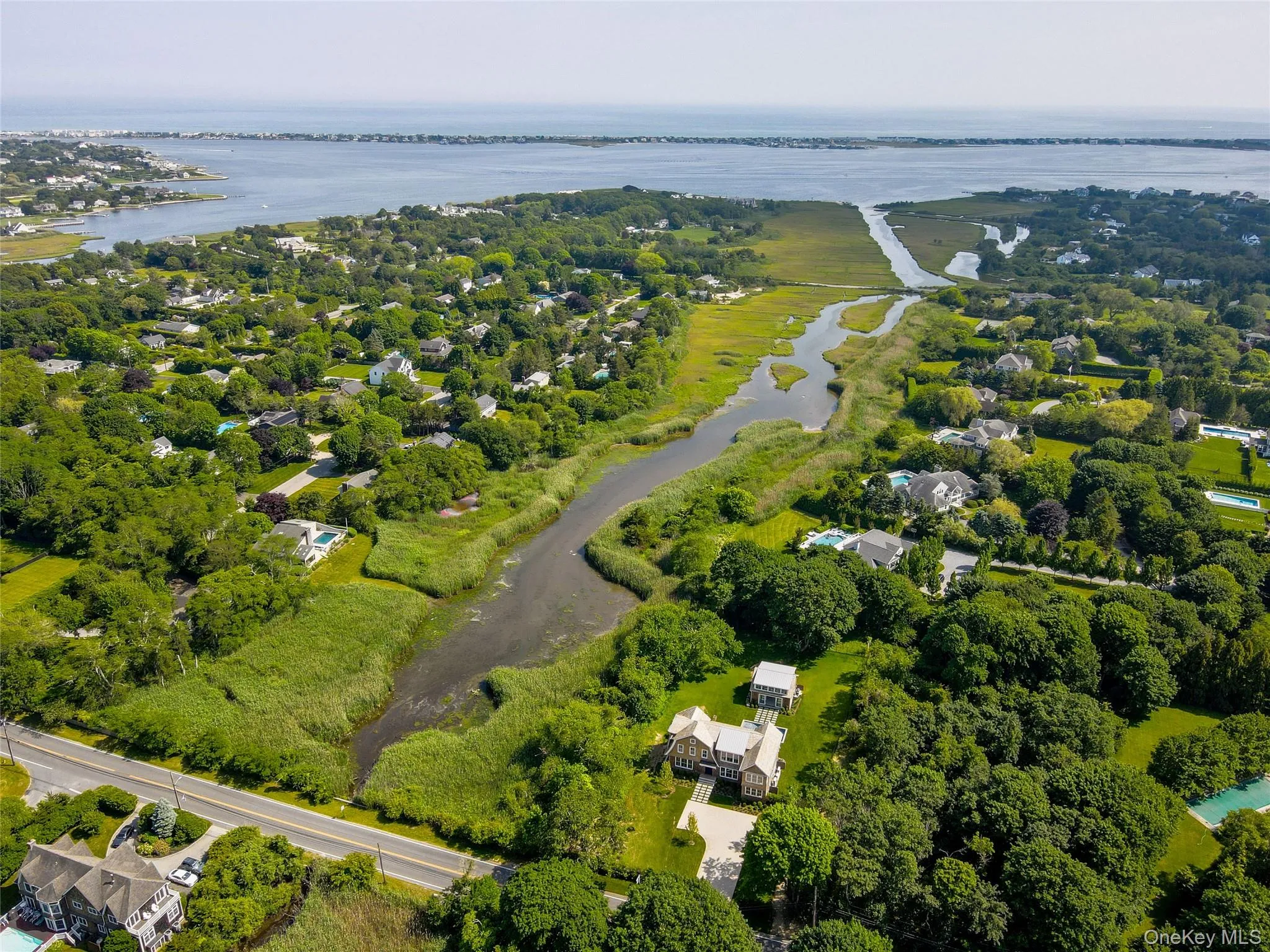 Privacy reigns here at this tucked away waterfront location, within minutes of Westhampton Beach Main St shopping and the Ocean Beaches Privacy reigns here at this tucked away waterfront location, within minutes of Westhampton Beach Main St shopping and the Ocean Beaches