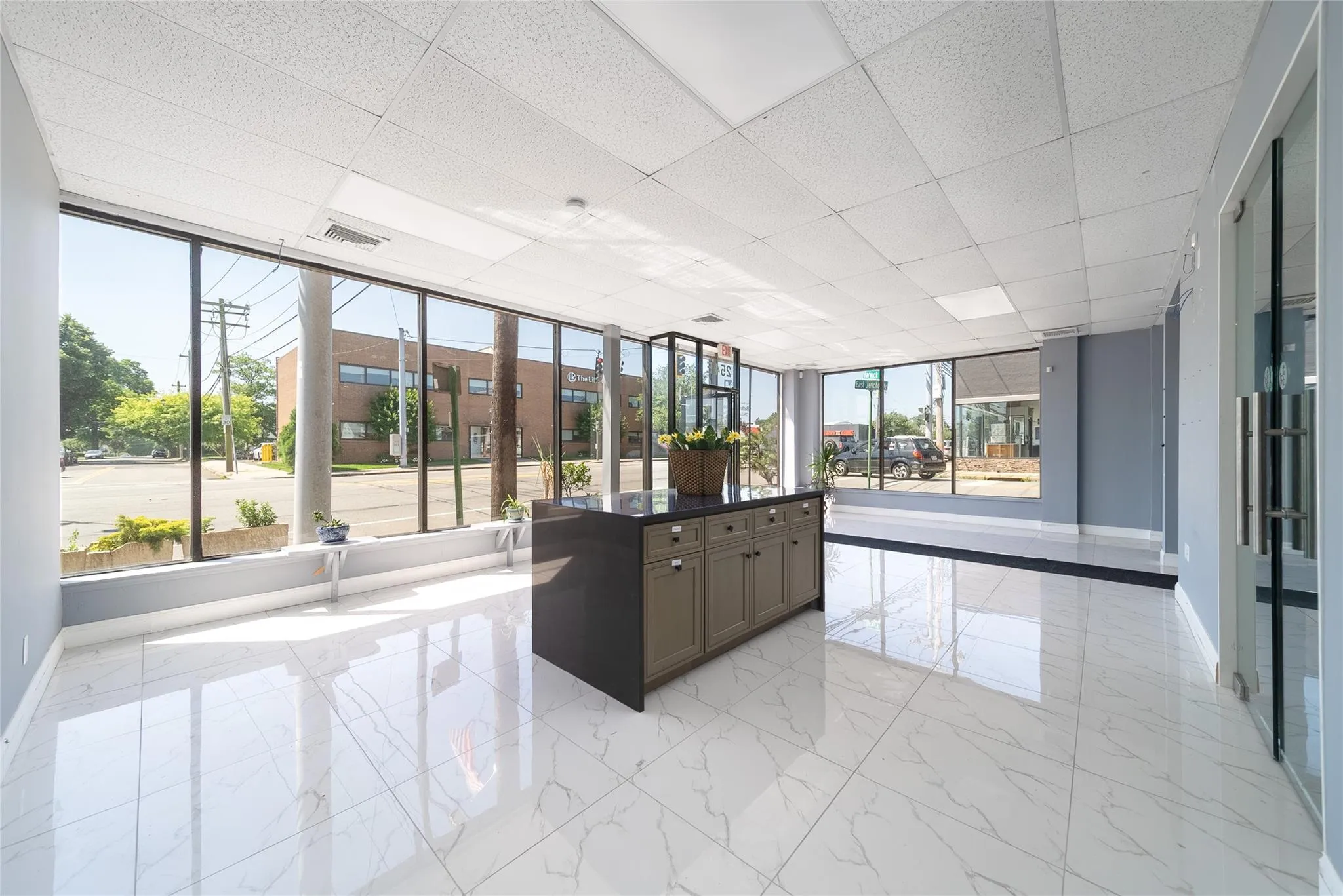 Common area featuring a drop ceiling Common area featuring a drop ceiling