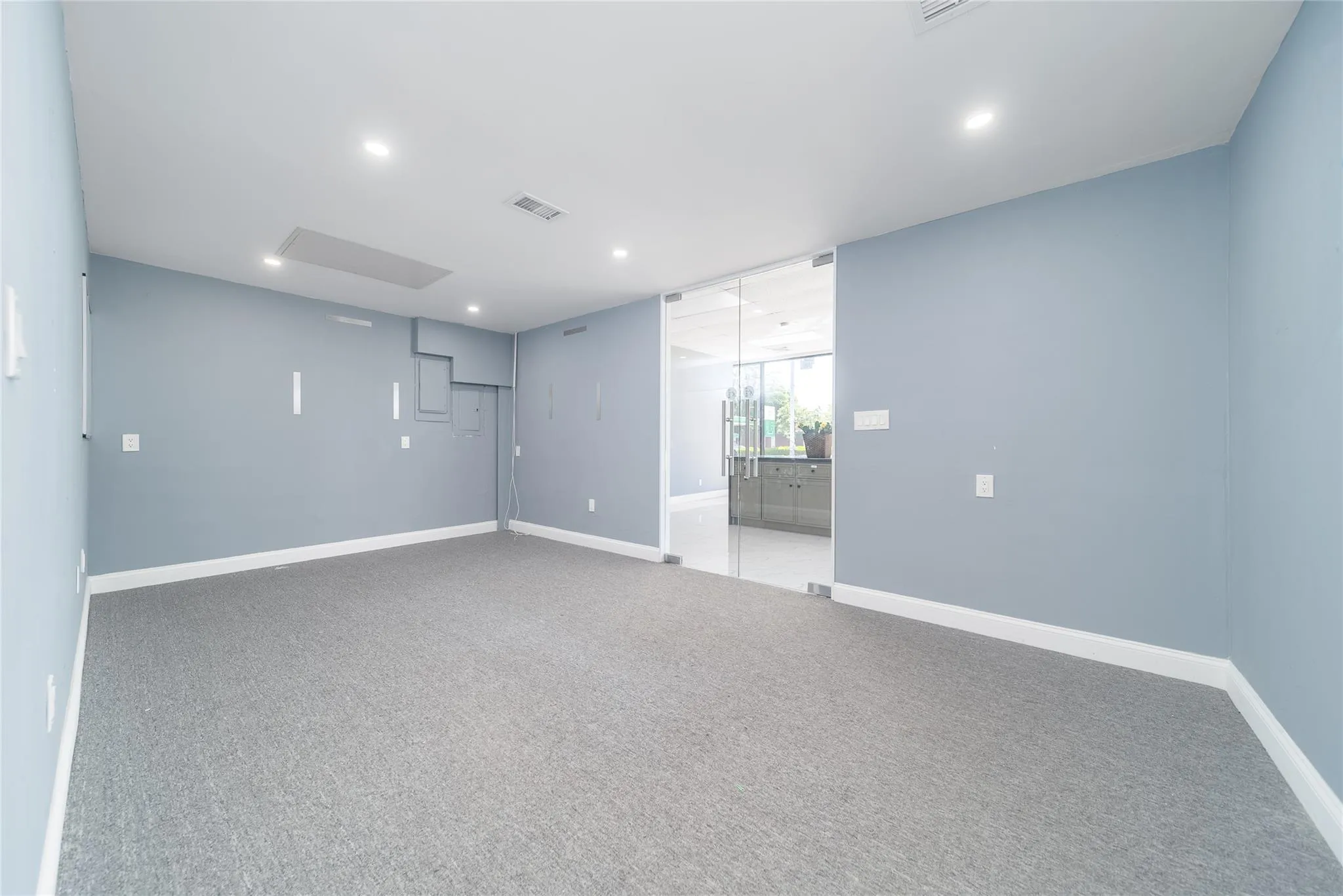 Unfurnished room with recessed lighting and carpet Unfurnished room with recessed lighting and carpet