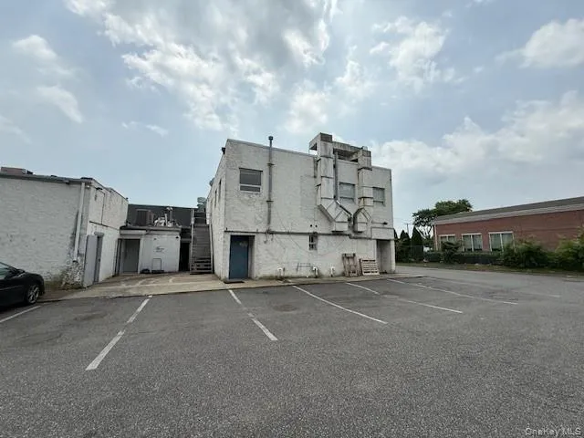 View of uncovered parking lot View of uncovered parking lot