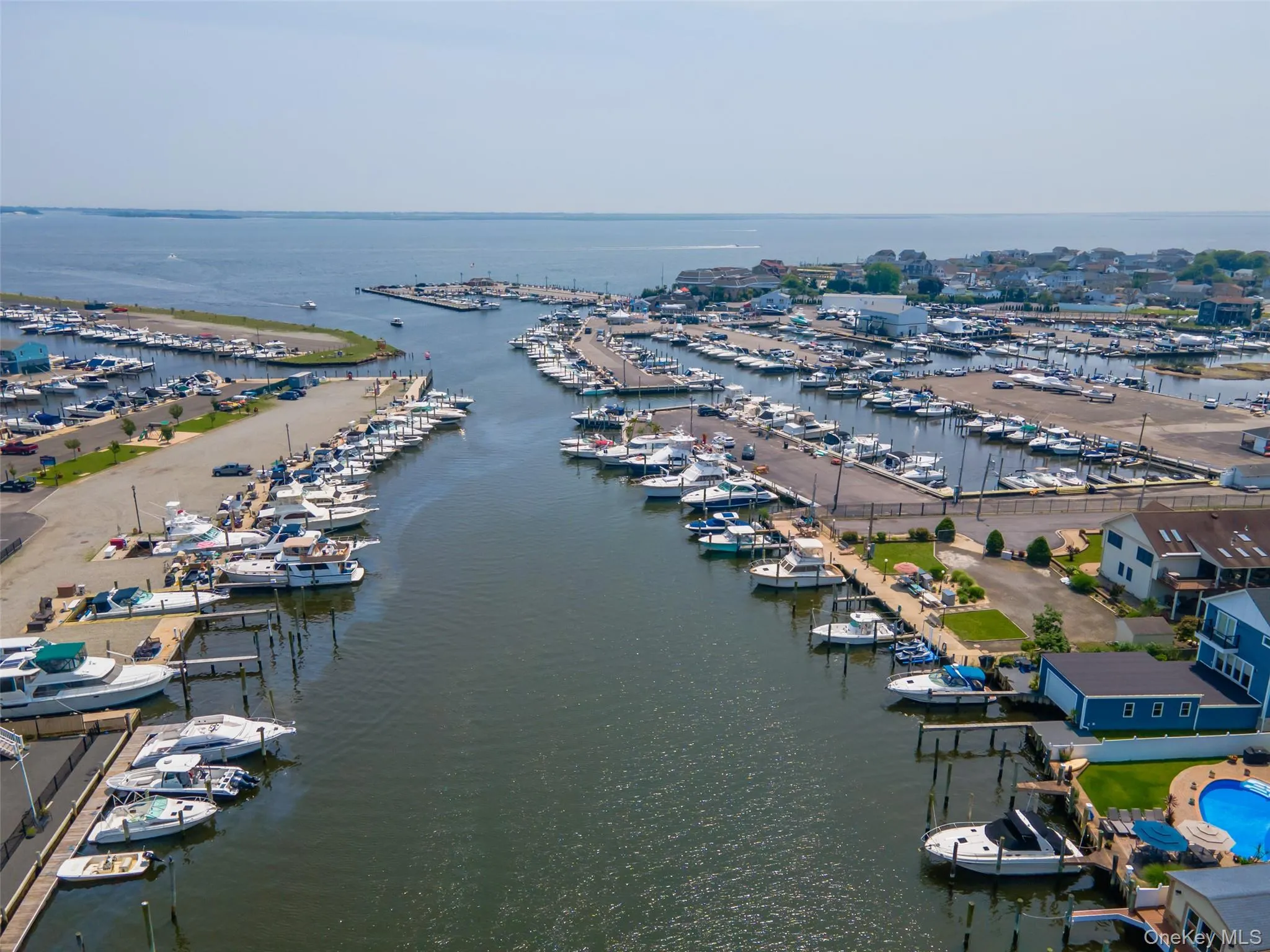 Aerial view of a marina and a large body of water Aerial view of a marina and a large body of water