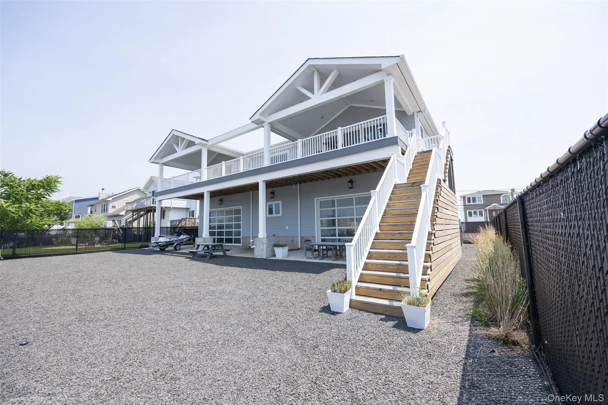 View of front of house featuring a patio and stairway View of front of house featuring a patio and stairway