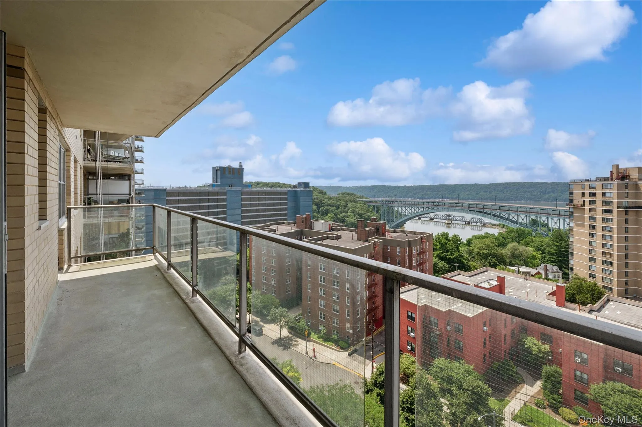 Balcony with a city view and a water view Balcony with a city view and a water view