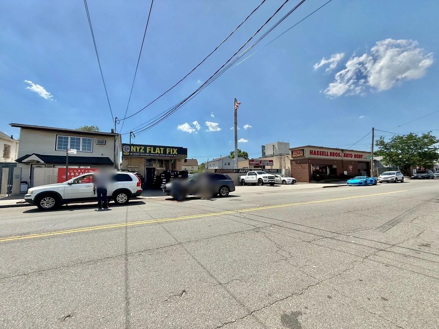 View of asphalt road with curbs View of asphalt road with curbs