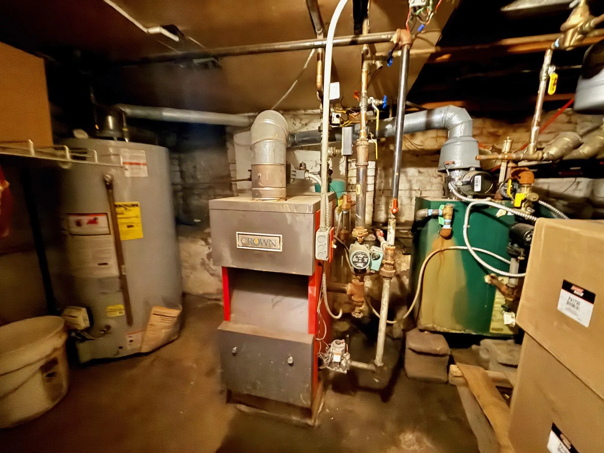 Utility room with water heater Utility room with water heater