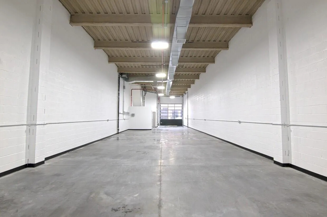 Basement featuring a garage Basement featuring a garage