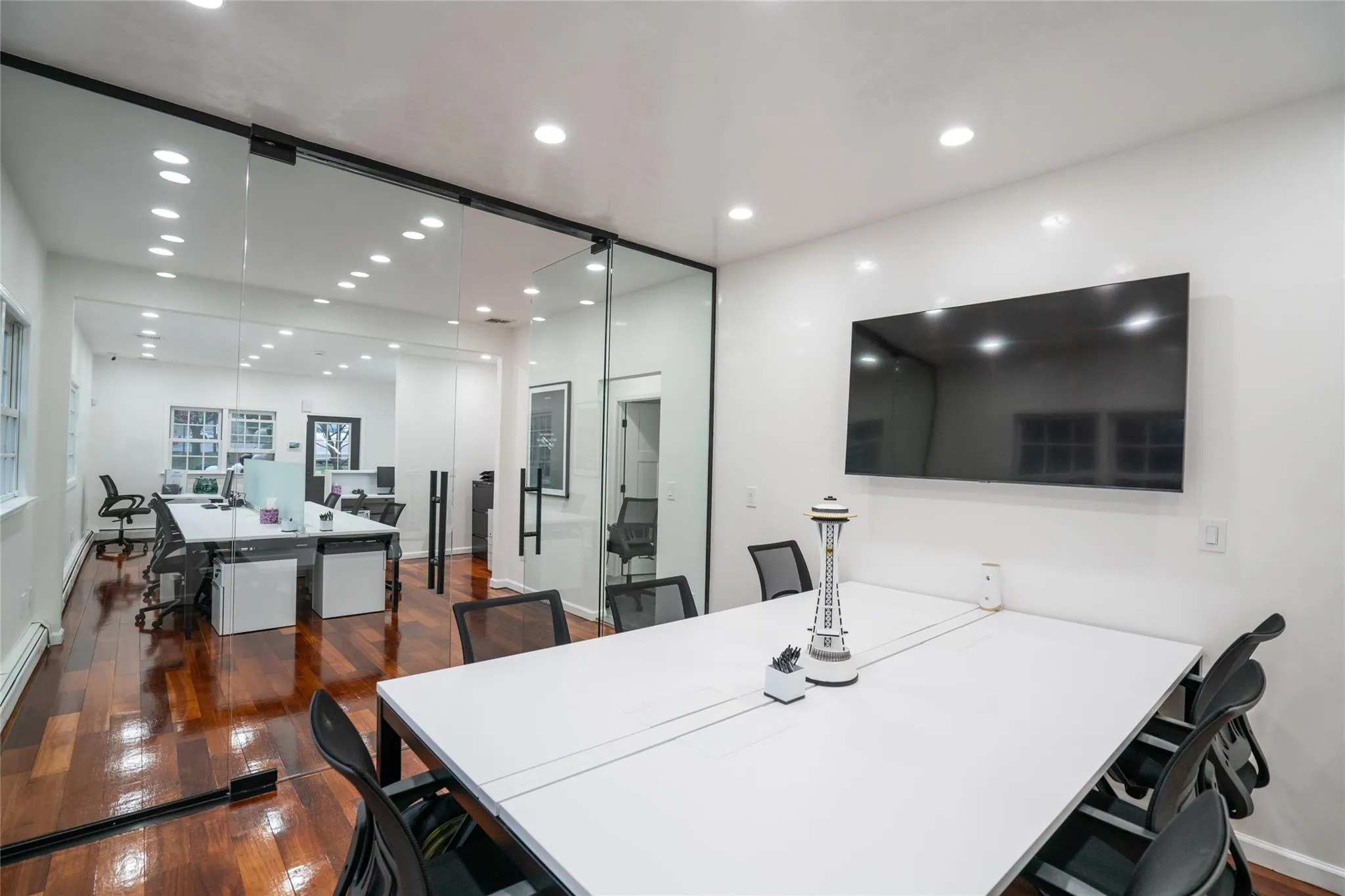 Office with recessed lighting and hardwood / wood-style floors Office with recessed lighting and hardwood / wood-style floors