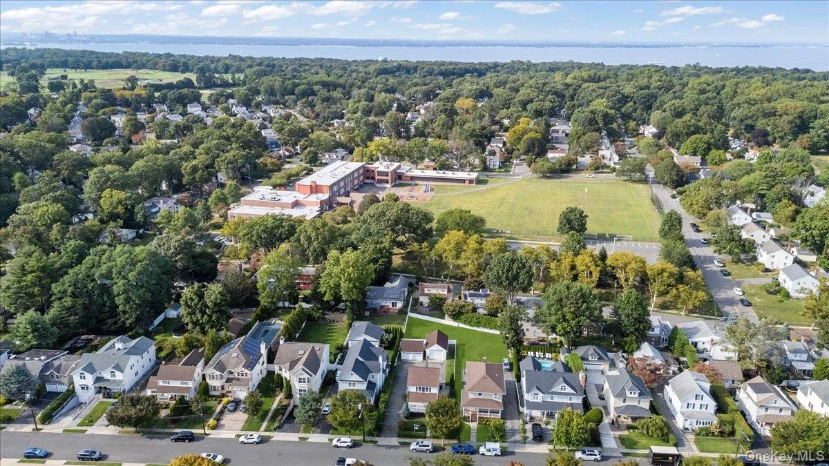 View of property location featuring nearby suburban area and a nearby body of water View of property location featuring nearby suburban area and a nearby body of water