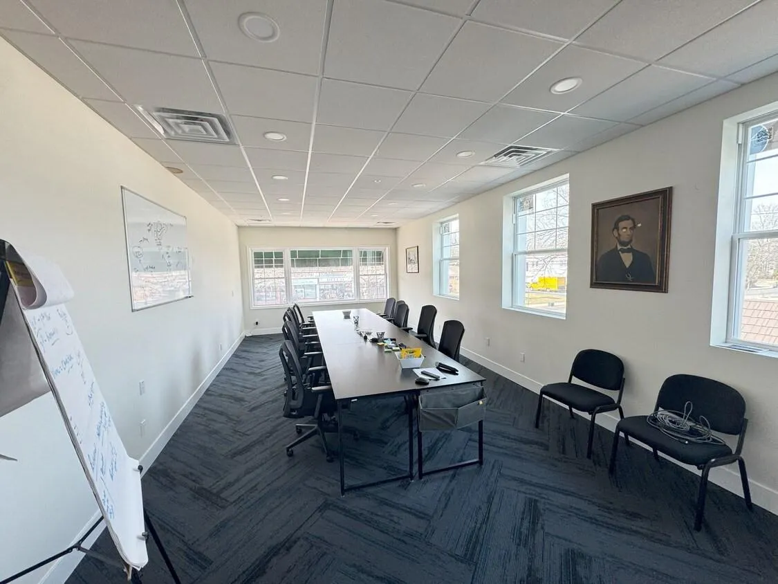 Office area with a paneled ceiling and recessed lighting Office area with a paneled ceiling and recessed lighting