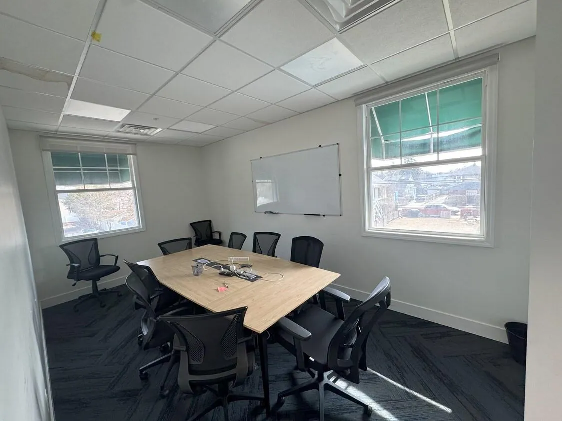 Dining space with a paneled ceiling Dining space with a paneled ceiling