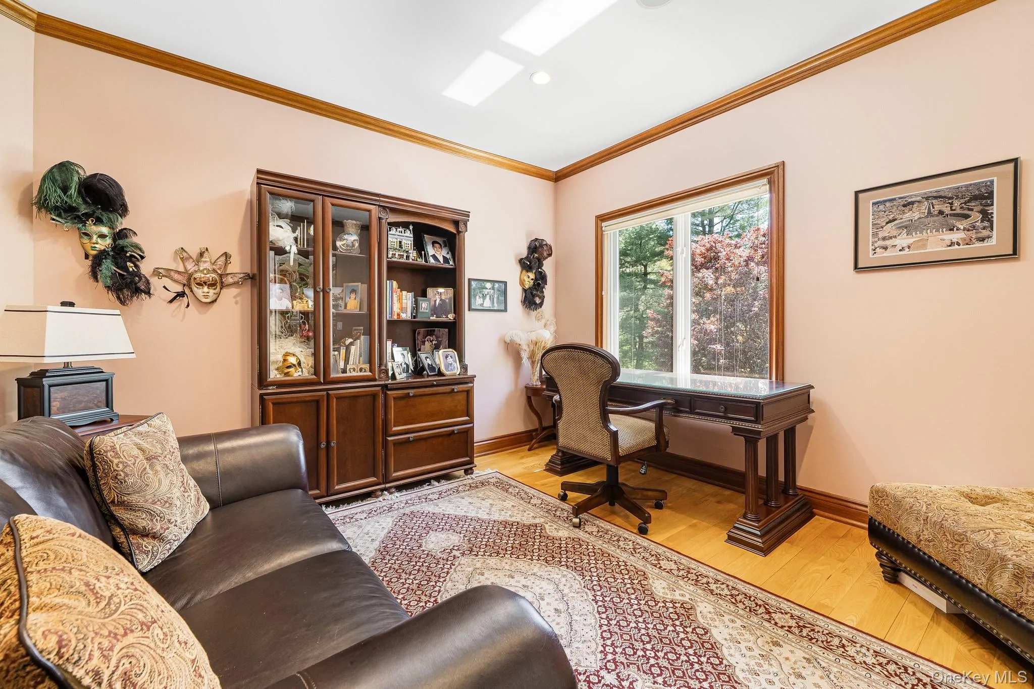 Office area with light wood-style flooring, crown molding, and recessed lighting Office area with light wood-style flooring, crown molding, and recessed lighting