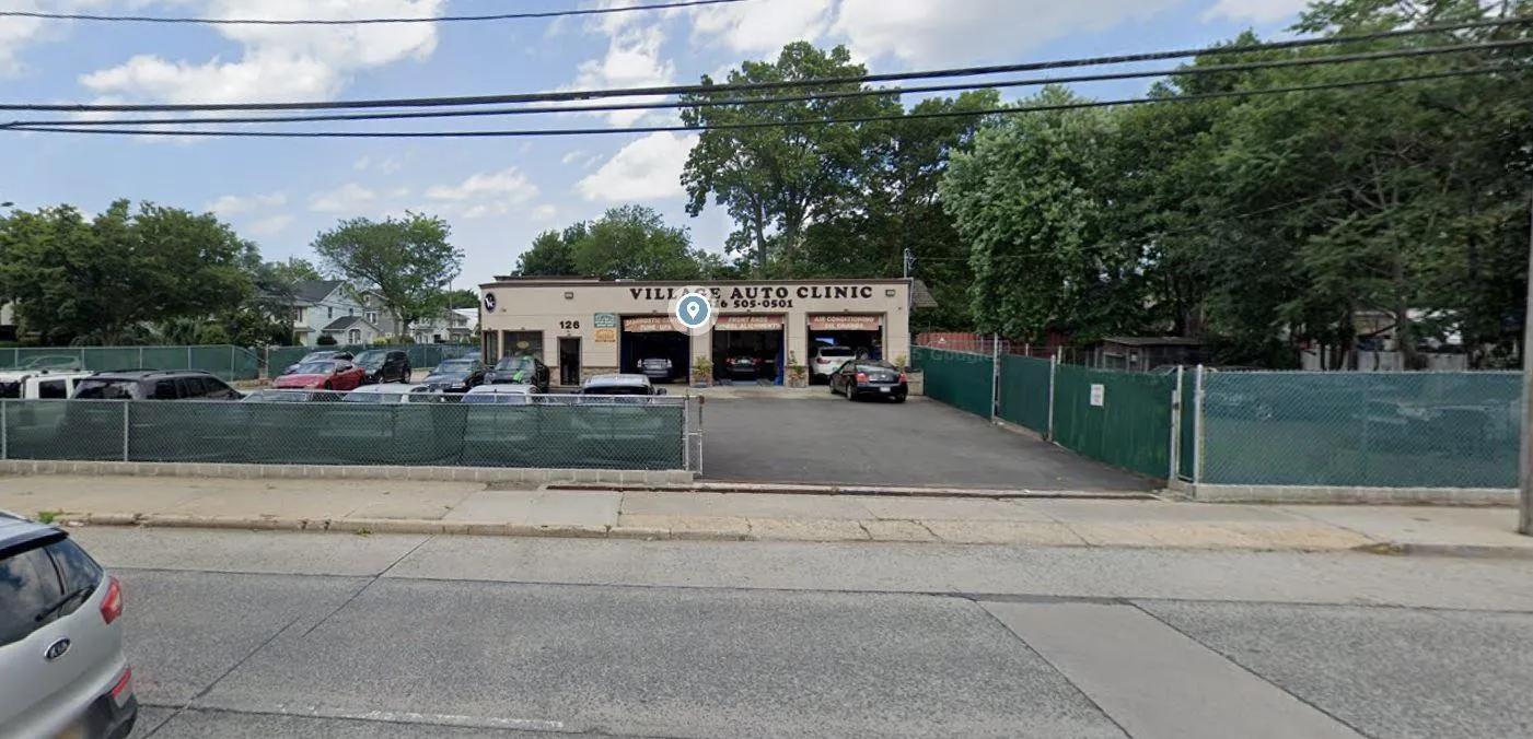 View of commercial location featuring uncovered parking View of commercial location featuring uncovered parking