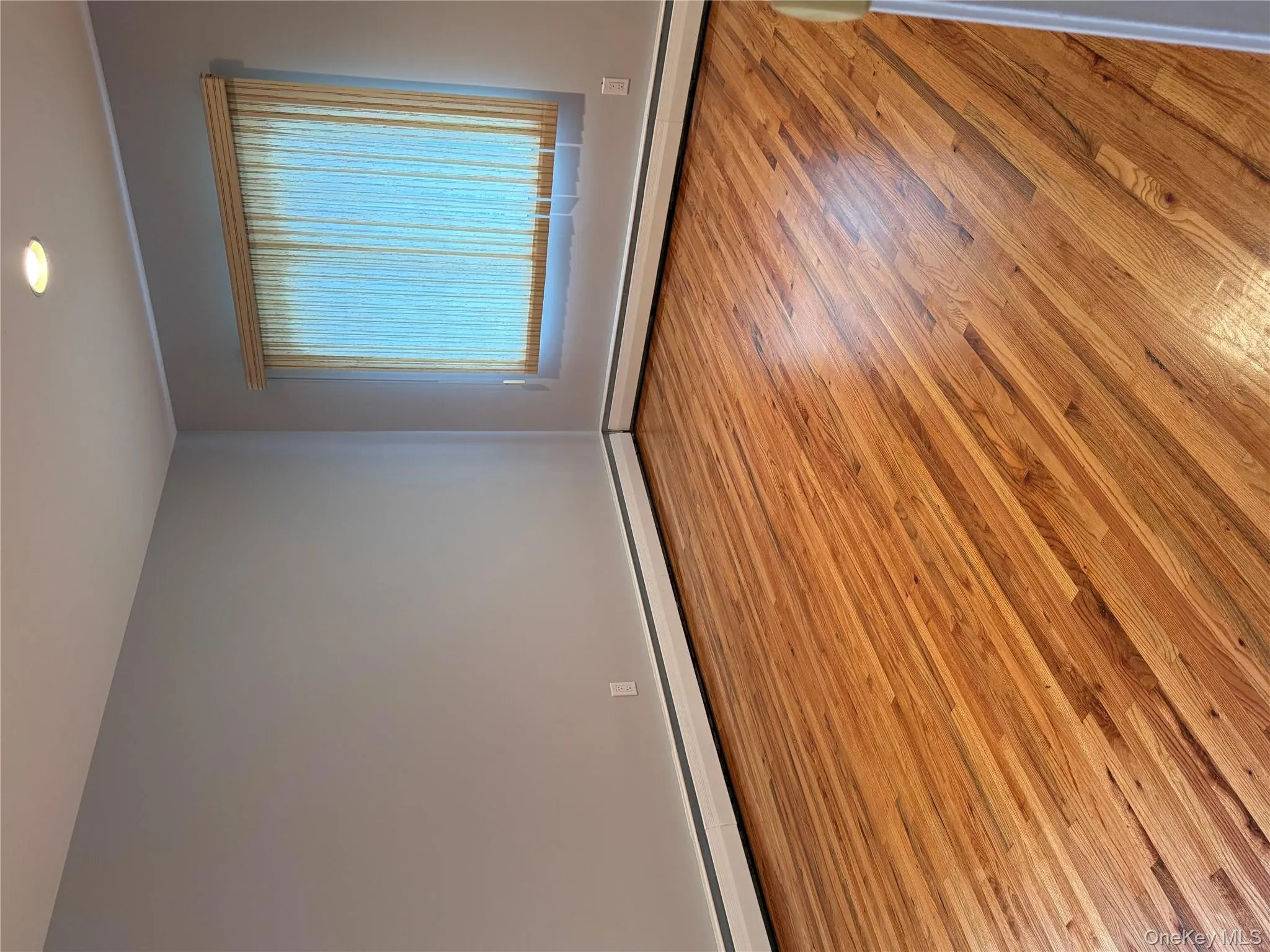 BR # 2 Empty room featuring light wood-style flooring, a baseboard heating unit, and recessed lighting BR # 2 Empty room featuring light wood-style flooring, a baseboard heating unit, and recessed lighting