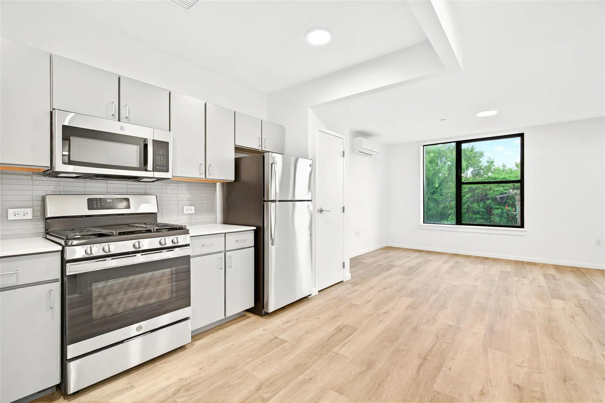 Kitchen showing stainless steel refrigerator, stove, microwave and dishwasher Kitchen showing stainless steel refrigerator, stove, microwave and dishwasher