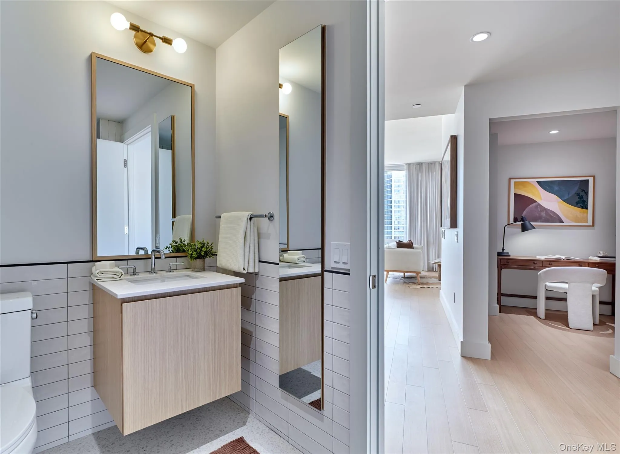 Bathroom featuring vanity and recessed lighting Bathroom featuring vanity and recessed lighting