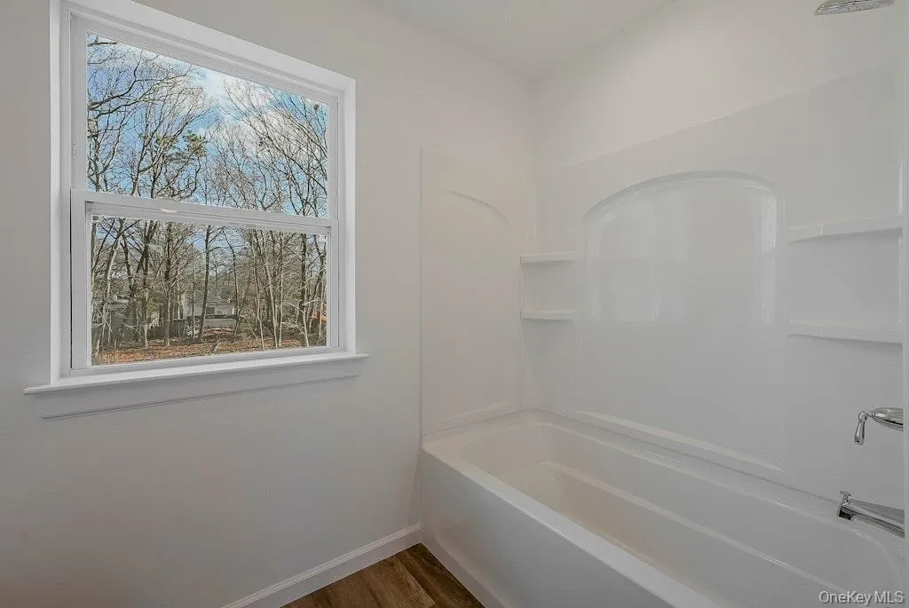 Full bath , plenty of natural light, and shower / bathtub combination Full bath , plenty of natural light, and shower / bathtub combination