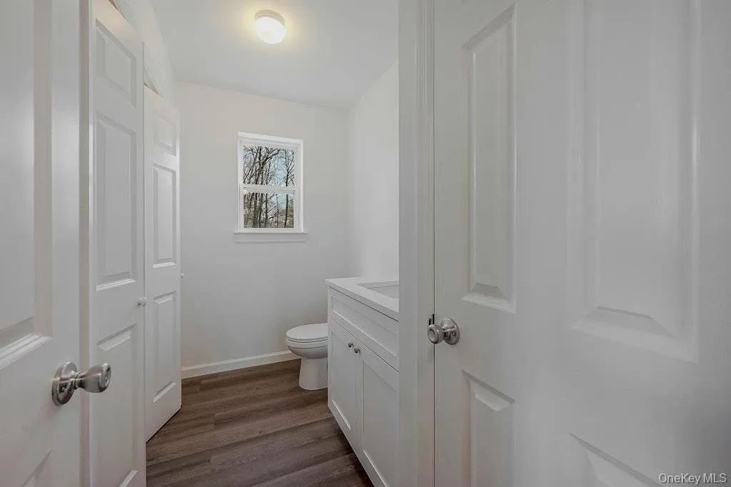Half bath off of the kitchen Half bath off of the kitchen