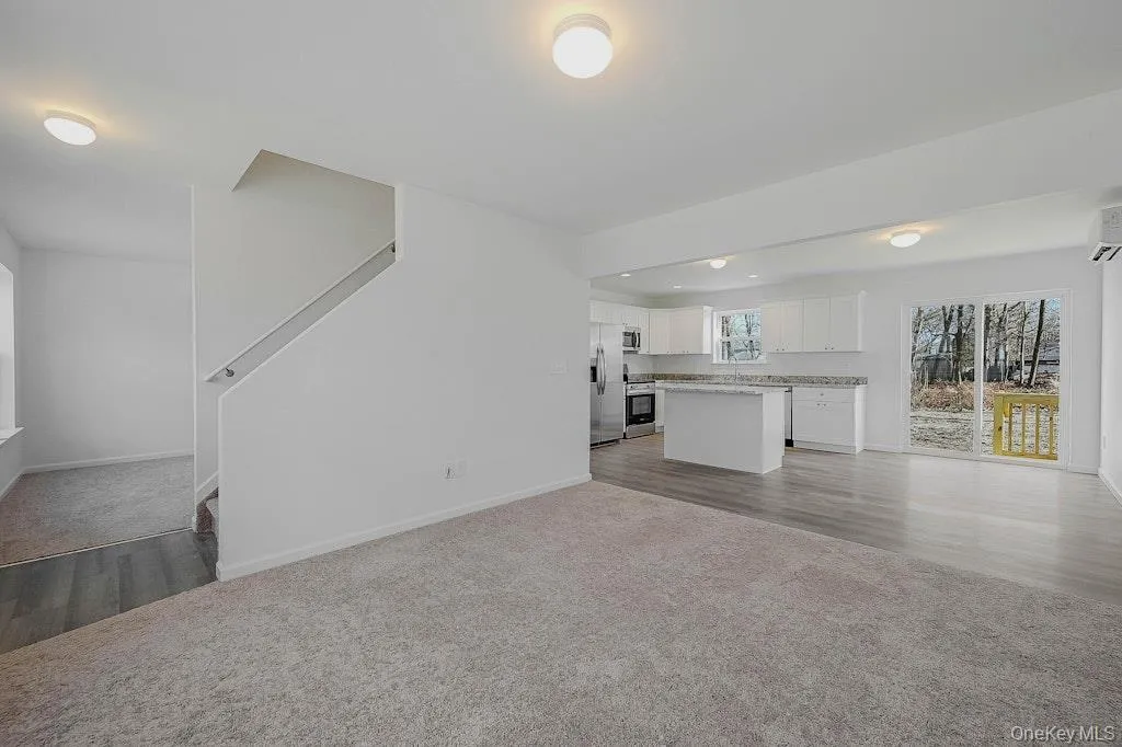 Living room shows with carpet from a different location Living room shows with carpet from a different location