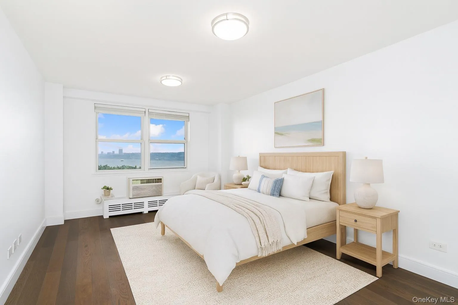 Bedroom featuring dark wood-style floors, baseboard heating, and an AC wall unit Bedroom featuring dark wood-style floors, baseboard heating, and an AC wall unit