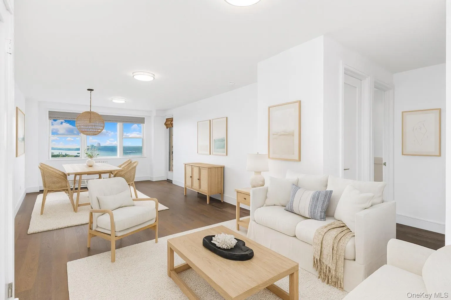 Living area featuring wood finished floors and baseboards Living area featuring wood finished floors and baseboards
