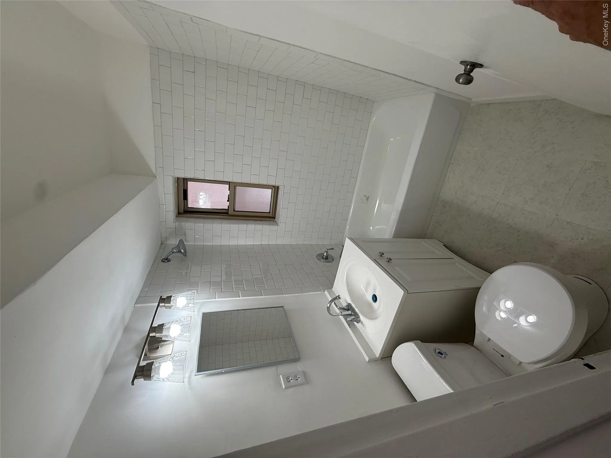 Bathroom featuring vanity and tub / shower combination Bathroom featuring vanity and tub / shower combination