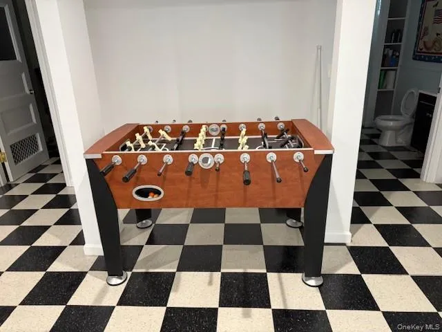 Rec room with tile patterned floors Rec room with tile patterned floors