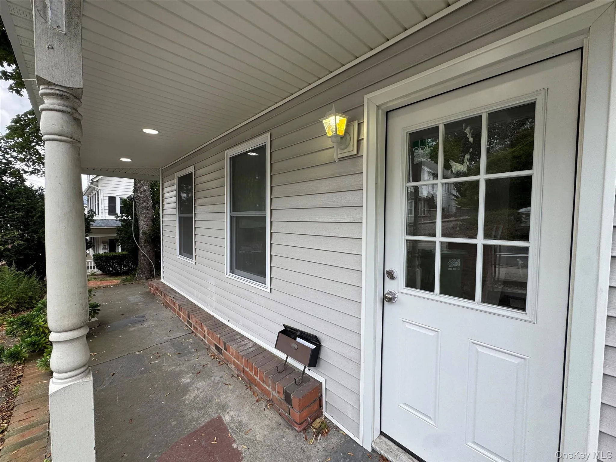 Entrance to property with covered porch Entrance to property with covered porch