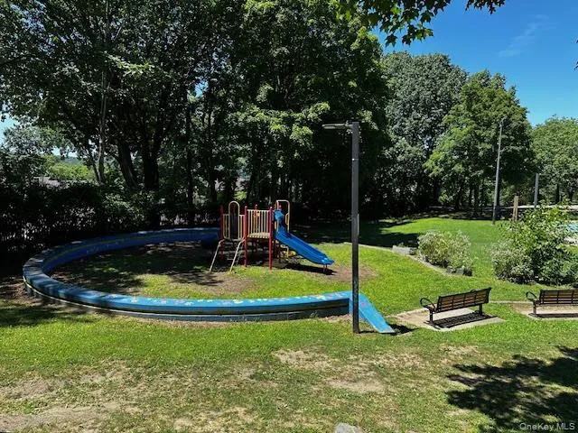 View of playground with a lawn View of playground with a lawn