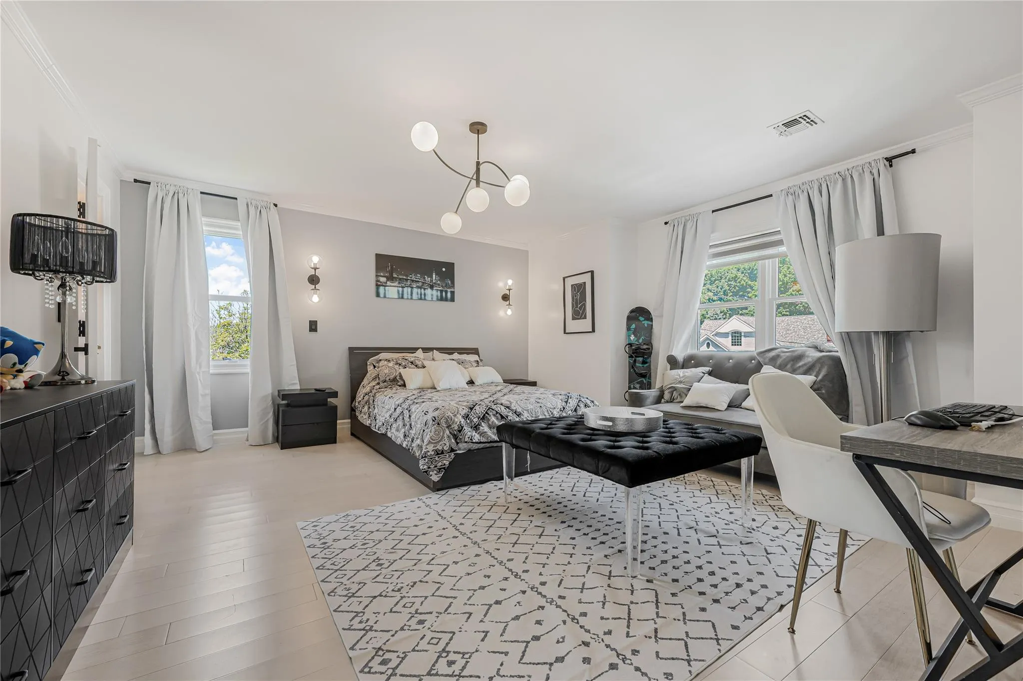 Bedroom featuring ornamental molding Bedroom featuring ornamental molding