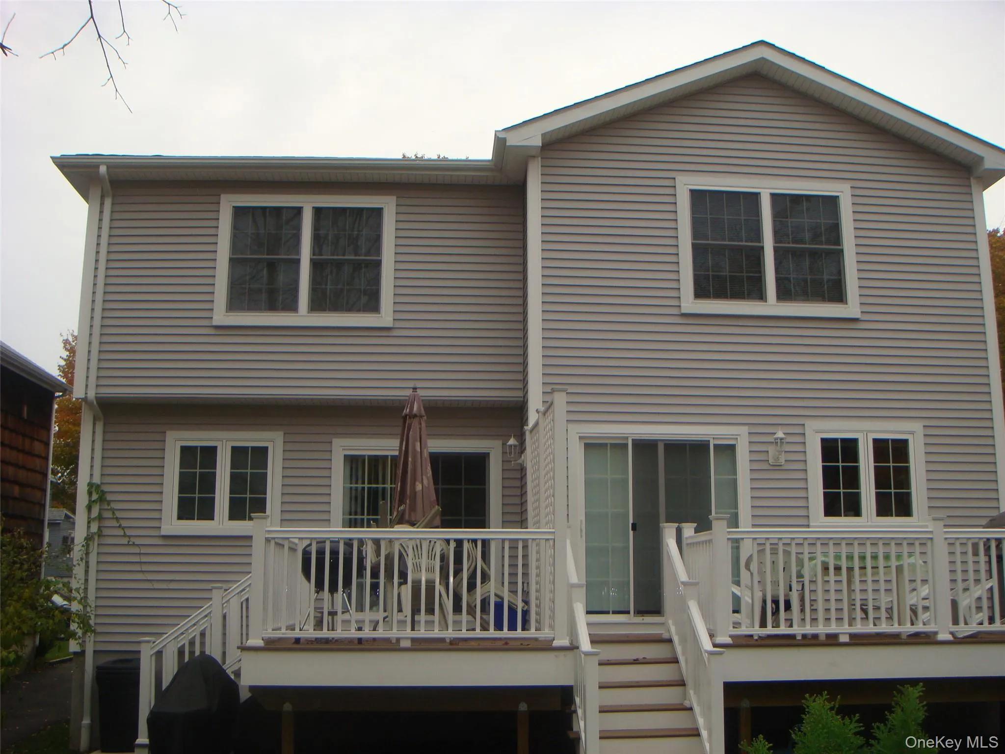 Back of house with a deck Back of house with a deck