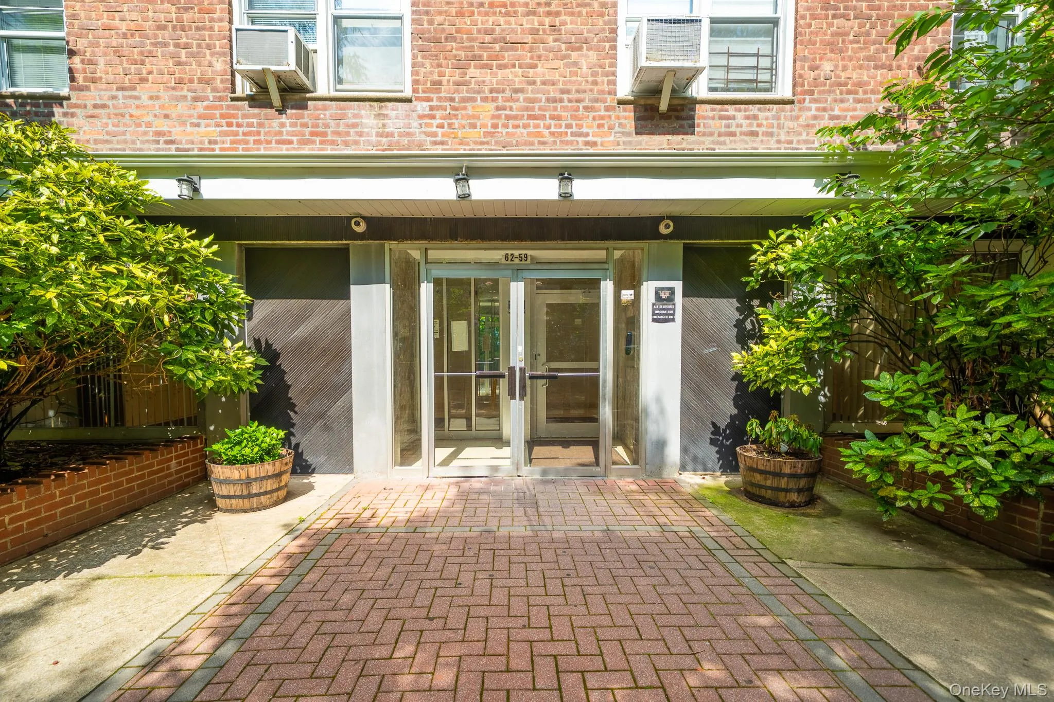 Property entrance with brick siding Property entrance with brick siding