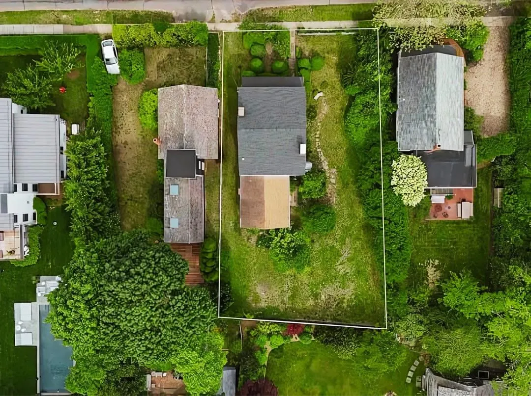Aerial view of property and surrounding area with property parcel outlined Aerial view of property and surrounding area with property parcel outlined