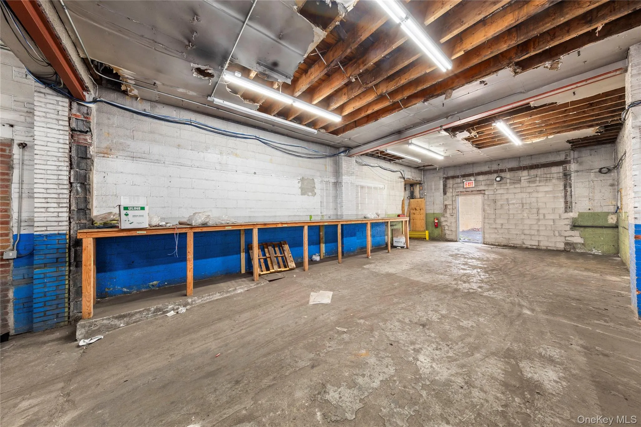 Garage with a workshop area Garage with a workshop area