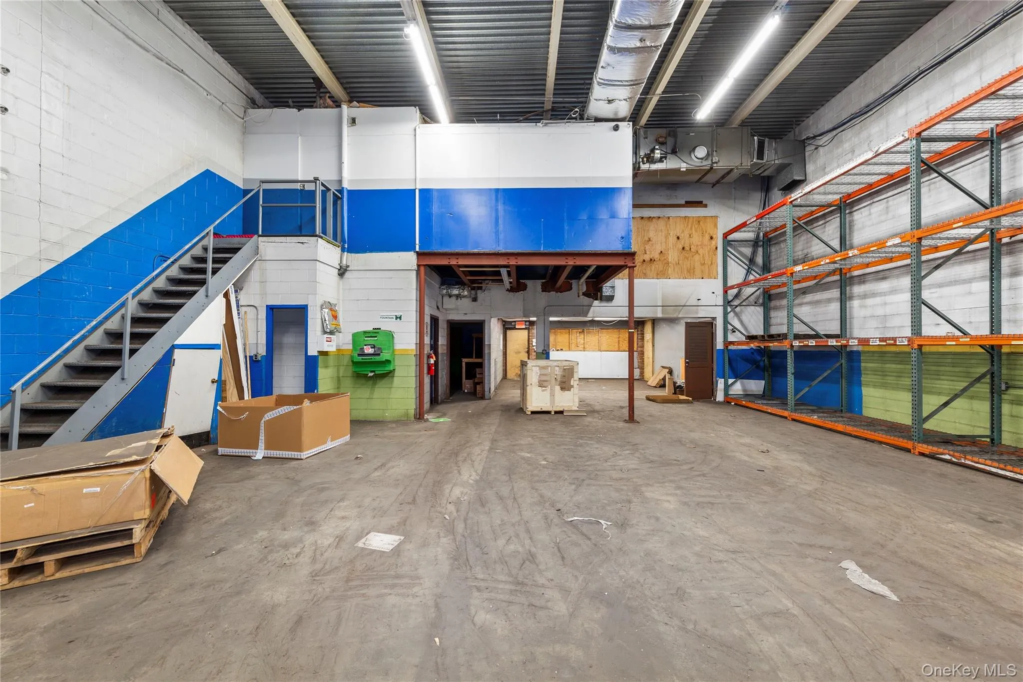 Miscellaneous room featuring concrete floors Miscellaneous room featuring concrete floors