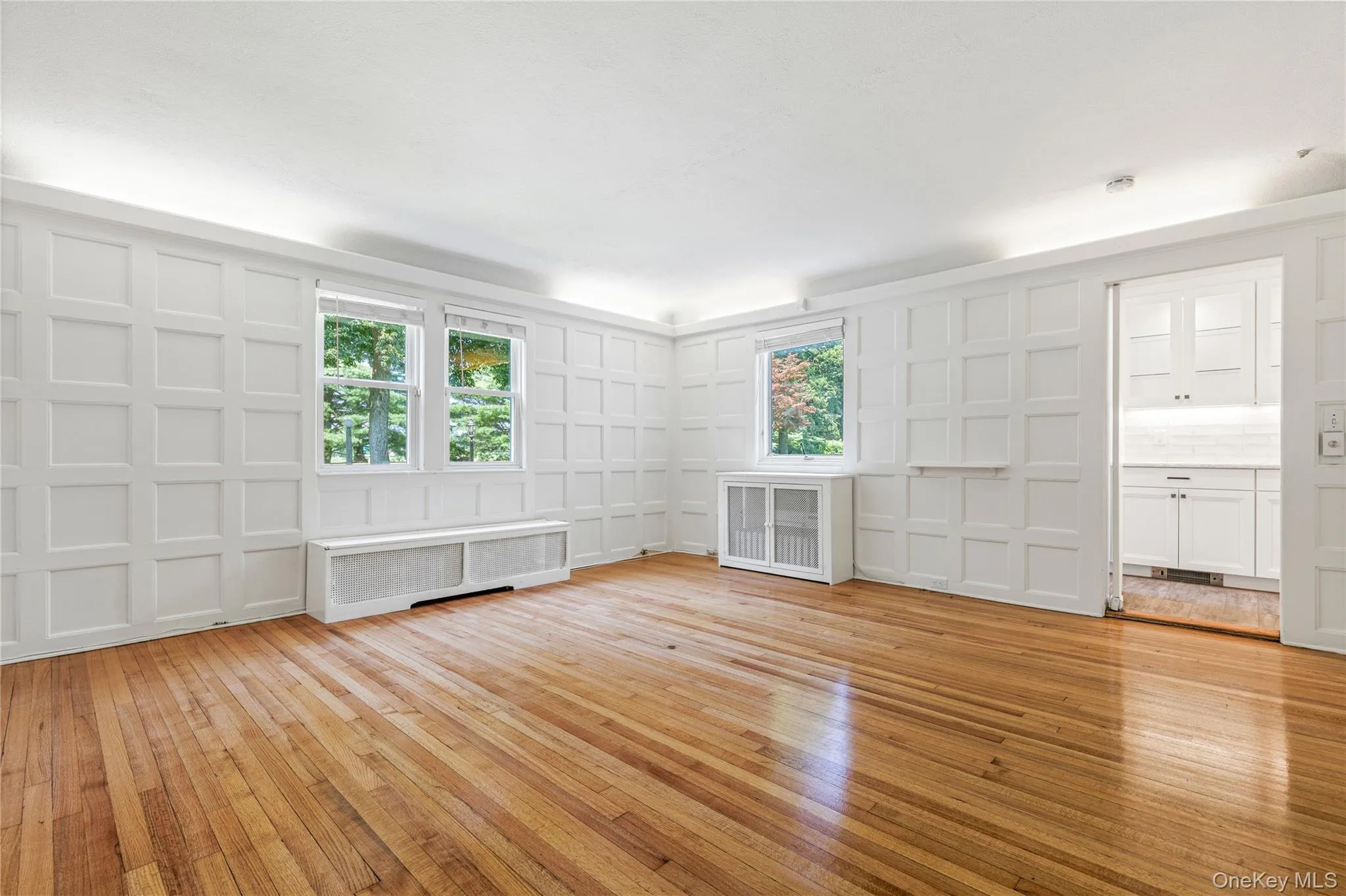 The Dining Room also features elegant custom paneling and cove uplighting The Dining Room also features elegant custom paneling and cove uplighting