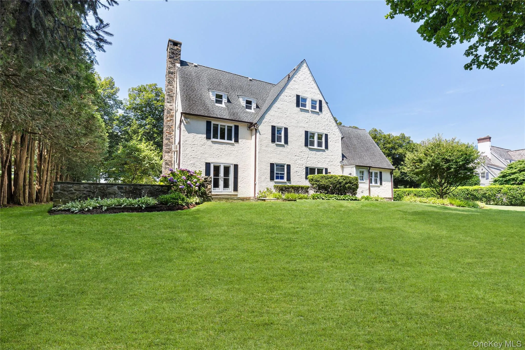 Beautiful rear view of the house and yard Beautiful rear view of the house and yard