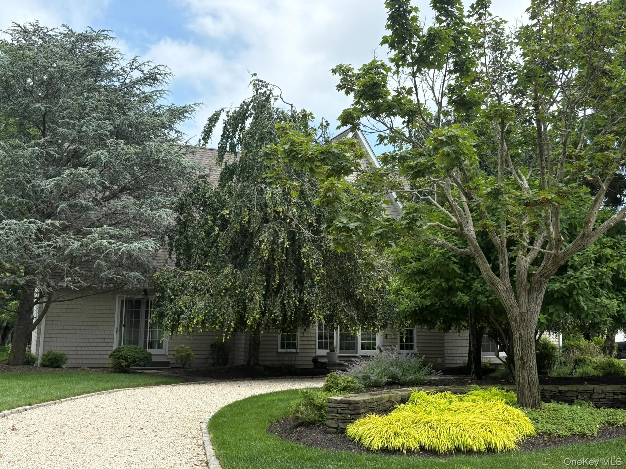 View of property hidden behind natural elements View of property hidden behind natural elements